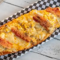 California Style Pepito · Tenderloin, chicken, or beef and chicken. 1/2 baguette, 14 oz. meat, corn, bacon over Chedda...