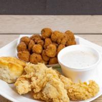 #1 Combo · 4 Express Tenders served with gravy, 1 regular side item, a 32oz drink, and a biscuit or roll.
