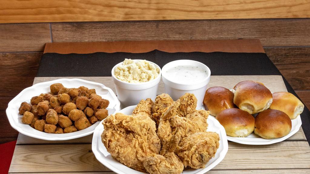 #12 Family Meal · 12 Piece mixed chicken severed with 2 family sides, and 6 biscuits or 6 rolls.
