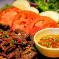 Yum Nuer · Vegetarian, spicy. Your choice of thin-sliced grilled protein tossed in soy sauce. Served w/...
