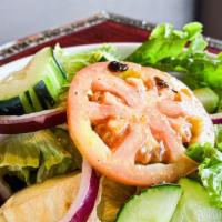 Madam Mam’S Salad · Vegetarian, no fish sauce. Served w/ your choice of house balsamic & soy dressing or house p...