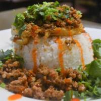 Thai Egg Explosion · Spicy. A crispy & oozy wok-fried egg resting on a bed of rice then topped w/ your choice of ...
