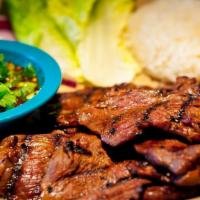 Tiger Cry · 12 oz of USDA CHOICE®, grilled, marinated tender cut beef w/ Mam’s special sauce served w/ s...