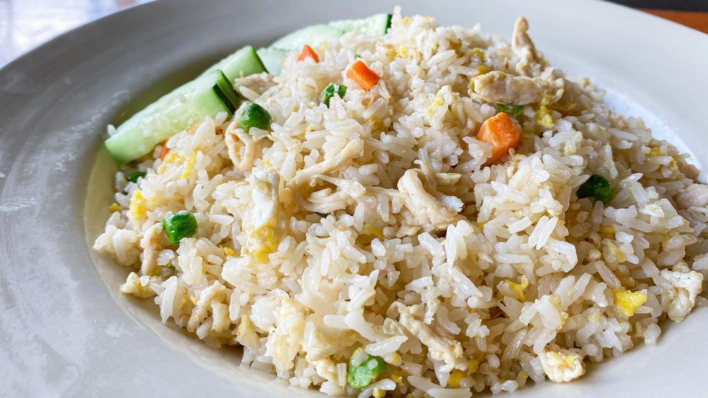 House Fried Rice · Vegetarian, no fish sauce. Stir-fried rice w/ your choice of meat, eggs, peas & carrots & mixed soy sauce.