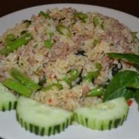 Spicy Basil Fried Rice · Spicy. Fried rice with choice of GROUND meat in intense fresh chili, garlic soy sauce, Thai ...