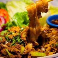 Guay Tiew Nuer Sub · Stir-fried Flat rice noodle topped w/ GROUND meat, celery, red onions mushroom & mixed soy s...