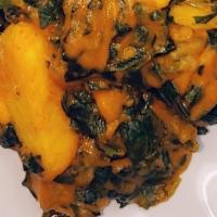 Yam Porridge · Cut up pieces of yam cooked in bell peppers, tomatoes and spices