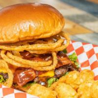 Western Burger · Bacon, American cheese, BBQ sauce, topped with a fried onion ring.