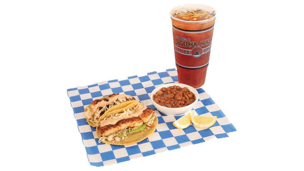 Combo Meal 5 · Two fish or shrimp tacos on corn tortillas and large tea. Grilled or fried, with your choice of one side.