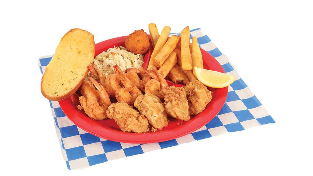 Shrimp & Oyster Plate · Six fried shrimp, four fried oysters, with two sides, bread, and hush puppies.