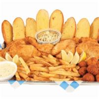 8 Pc. Fried Cod Family Meal · Served with fries, coleslaw, bread, and hush puppies.