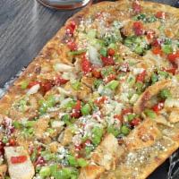 Baja Chicken Flatbread · Pepper jack & cotija cheeses, fire roasted red peppers, poblano sauce, scallions, onion & ci...