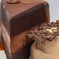 Man Flowers · Tall. Dark. Handsome. Proud and erect chocolate stout cake. Tart dark chocolate frosting. Ch...