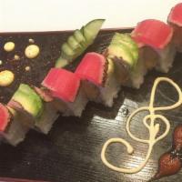 Sumac Roll (2 Sh) · Shrimp tempura, snow crab & smelt egg inside, topped w / pepper tuna & avocado.