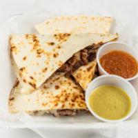 Quesadilla · Served with cheese, lettuce, tomato and a choice of meat.