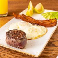 Steak And Eggs · 10 oz fillet mignon, two eggs over easy, served with tomato and crispy bacon.