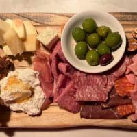 Salumi Italiani · Our Amazing Charcuterie board complete with Imported Italian cured meats (sopressata, salami...