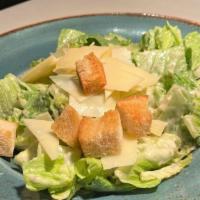 Nonnos Caesar Salad · Traditional Caesar dressing, romaine lettuce, homemade croutons, parmigiano-reggiano cheese....