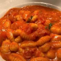 Gnocchi · Potato gnocchi & cherry tomatoes tossed in an amazing homemade tomato-cream sauce..topped wi...