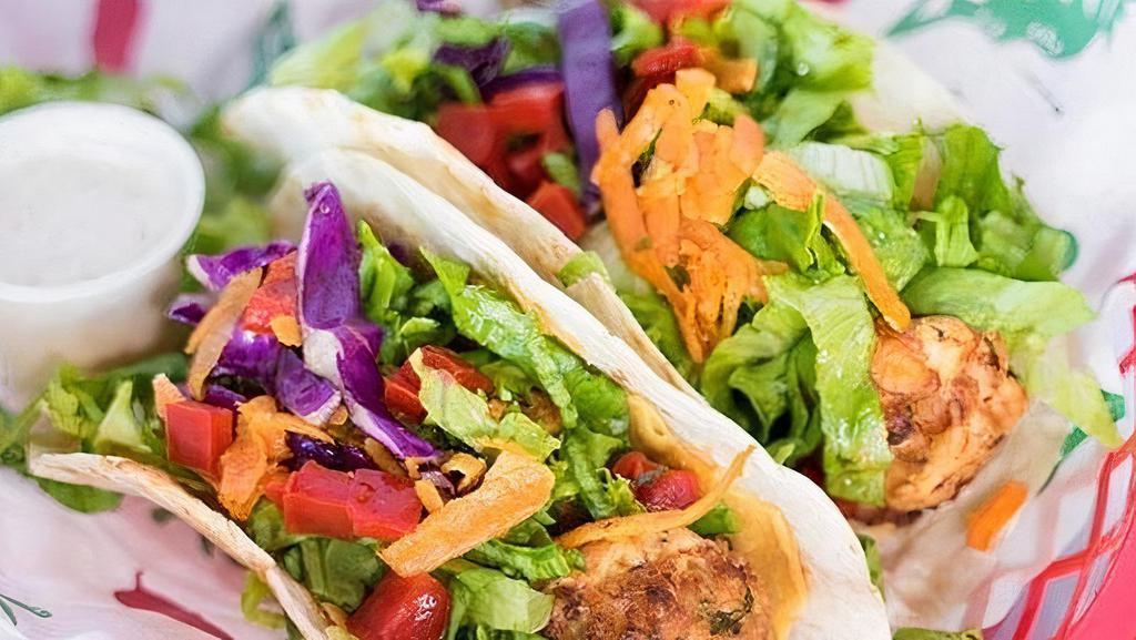 Grilled Fish Taco Combo · Two flour tortillas filled with grilled cod and our salad mix. Served with a side of Habanero Ranch dressing.