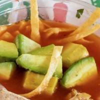 Taco Joe'S Tortilla Soup · A delicious bowl of hearty veggies and chicken in broth with tortilla strips, cheese, and av...