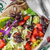 The Evan (Vegetarian) · Vegetarian. A wheat tortilla filled with black beans, rice, guacamole, tomatoes, salad mix a...