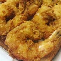 10Pc Fried Shrimp  · 10 PC fried shrimp, fries or shrimpfriedrice, signature sauce, dinner roll