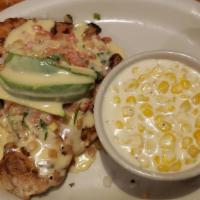 Southwestern Queso Chicken · Grilled chicken breast topped with fresh pico de gallo and avocado then smothered in Montere...