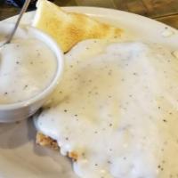 Chicken Fried Steak · Southern-style tenderized round steak hand-dipped and deep-fried to a golden brown. Smothere...