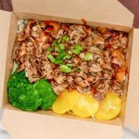 Beef Bento · Rice, thin, sliced beef and onion, sauteed in soy sauce, cabbage, broccoli, sushi ginger, pi...