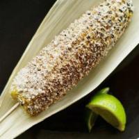 Elote Especial · Roasted corn with mayo, cotija cheese, house made chili powder, lime