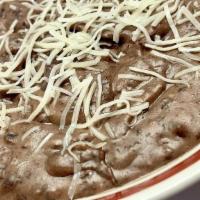 Black Bean Dip And Chips. · Chips with Black Bean Dip and Monterey jack cheese