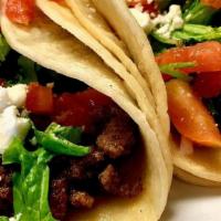 Taco Solo · Choice of tortilla, Meat, served with Lettuce (Fish and Shrimp served with home made slaw in...