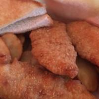 Chicken Strip Basket · Four breaded chicken strips served with a dipping sauce.