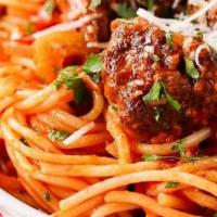 Spaghetti & Meatballs · Spaghetti topped with tomato sauce, meatballs & melted mozzarella cheese.