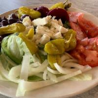 Greek Salad · Lettuce Tomato Onion Cucumber Olive and Feta Cheese