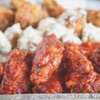 50 Wings · 50 Bone-In or Boneless Wings (Choose up to 5 Flavors and includes choice of Dressing)