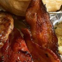 Ghetto Spot Plate · 2 scrambled eggs, grits, up to 3 meats (sausage, sausage link, bacon) and a honey butter bis...