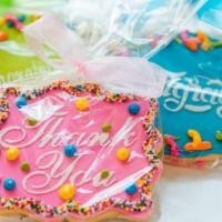 Thank You Cookie · decorated 'thank you' cookie wrapped in a clear cellophane bag with a bow