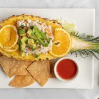 Ceviche Vallarta · Fresh shrimp, scallops, and fish fillet marinated with squeezed lime juice, and mixed with t...