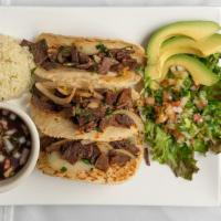 Street Tacos · (3) corn tortillas with bistec meat. Topping with grill onions, pico de gallo, avocado, cila...