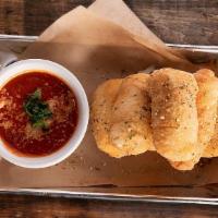 Cheesy Garlic Knots  · Stuffed dough with house Mozzarella and Pepperoni