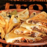 Kids Quesadilla · Flour tortilla, choice of meat with fries.