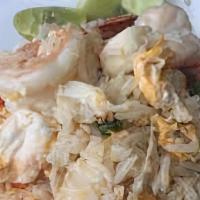 Crab And Shrimp Fried Rice · Crab meat and Shrimp with Jasmine rice, egg, onion and carrots