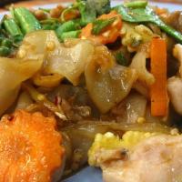 Pad See-Ew · Choice of Meat Chicken , Pork, Beef, Tofu or Mix Veggies wide rice noodles sautéed with broc...