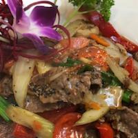 Pepper Steak  · Stir Fried slice beef flank steak with black pepper sauce onion bell pepper mushroom carrot ...
