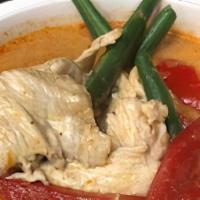 Panang Curry · Choice of Meat with green bean bell pepper and kaffir lime leaves in coconut milk and panang...
