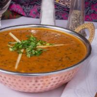 Dal Makhani · Rich and creamy black lentils simmered on slow fire.rice or breads NOT come with entress.