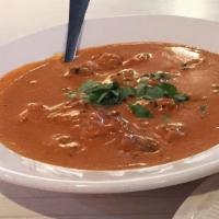 Tikka Masala · Exotic creamy tomato based curry, fused with garlic, ginger, cilantro and our special spices.
