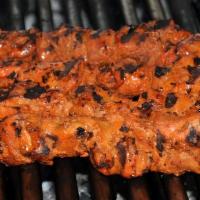 Chicken Tikka · Two skewers of boneless cubes of chicken slow grilled with our own marination full of flavor...
